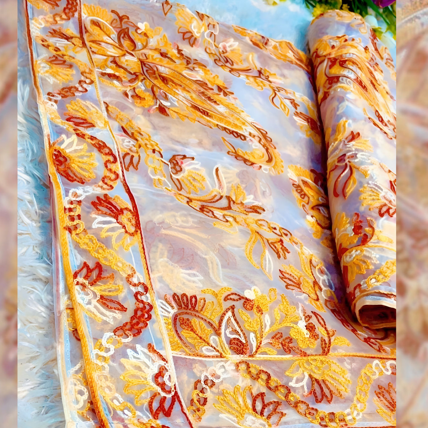 Close-up of elegant golden organza dupatta with detailed pasham thread embroidery showcasing intricate craftsmanship.