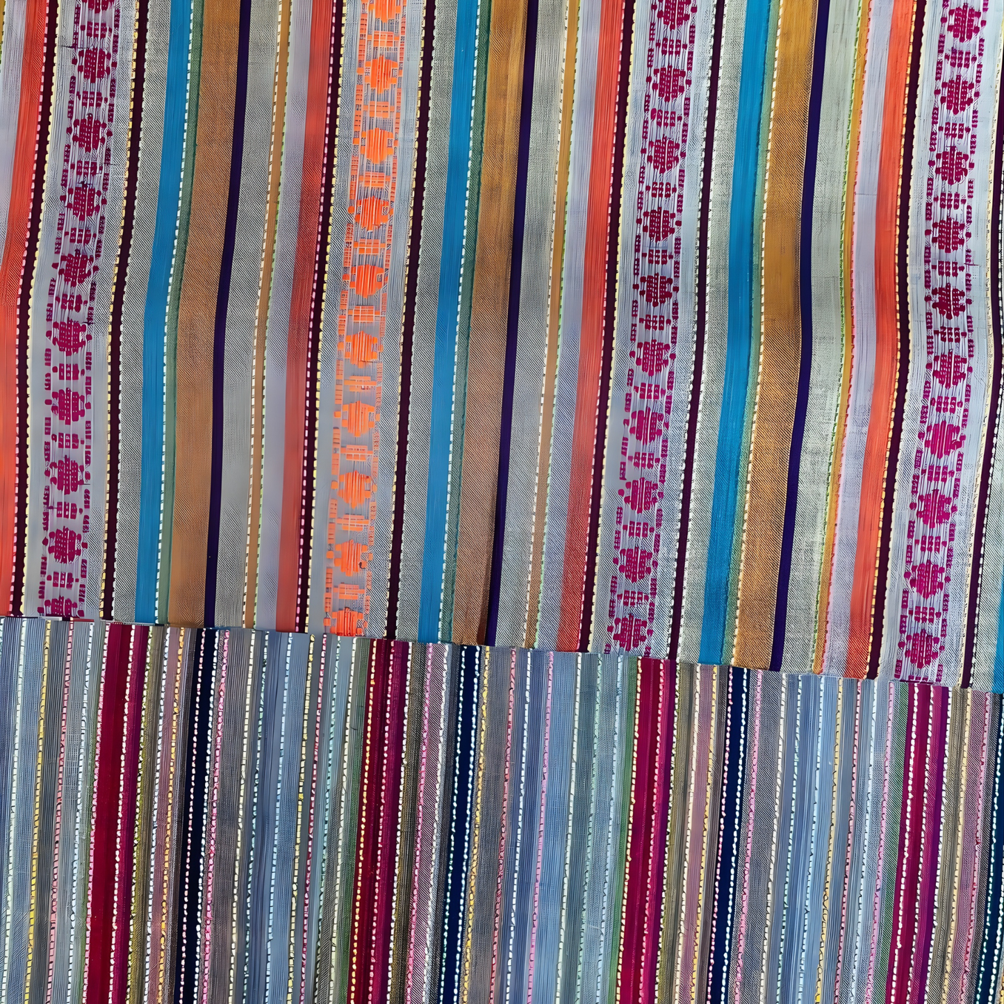 Close-up view of jacquard motifs and vibrant striped pattern on winter cotton fabric.