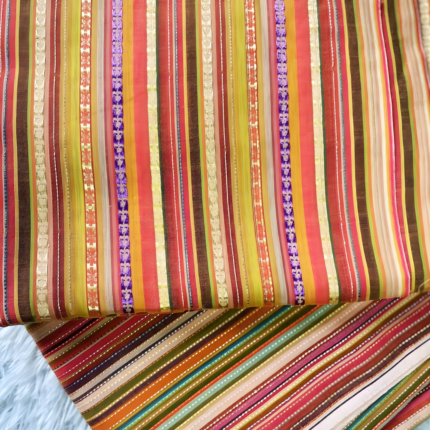 Multicolor jacquard striped fabric with gold detailing, ideal for dresses and kurtis from Sein Attire.