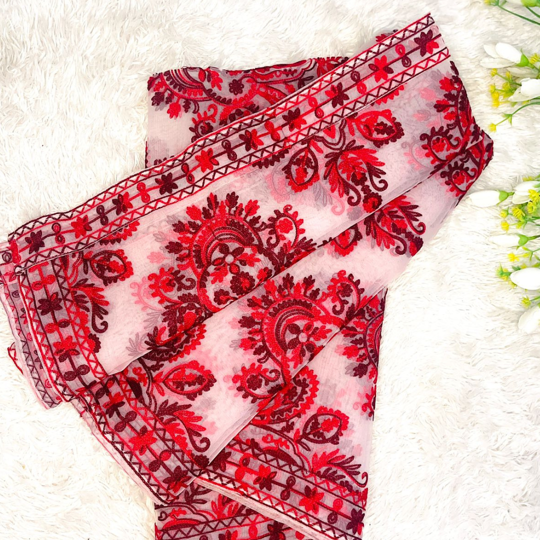 Layers of premium red organza dupatta featuring rich pasham thread embroidery, 2.5-yard length.