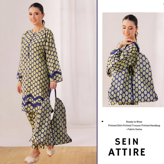 Model wearing a printed Swiss fabric 2-piece set with matching handbag by SEIN ATTIRE, featuring a printed shirt and trouser in blue and yellow tones.