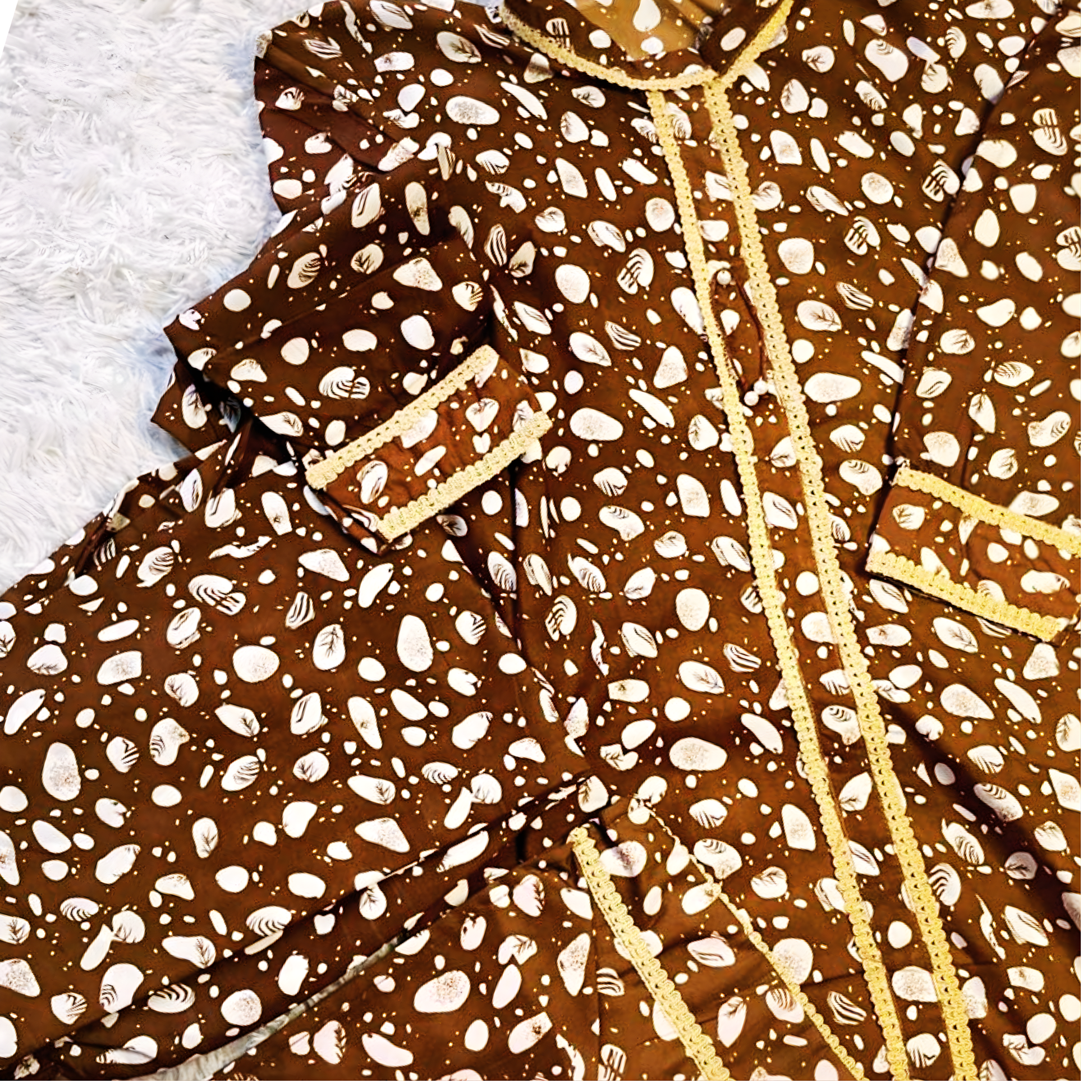 Elegant brown printed ready-to-wear outfit by SEIN ATTIRE with Swiss fabric, printed shirt, trouser, and matching handbag.