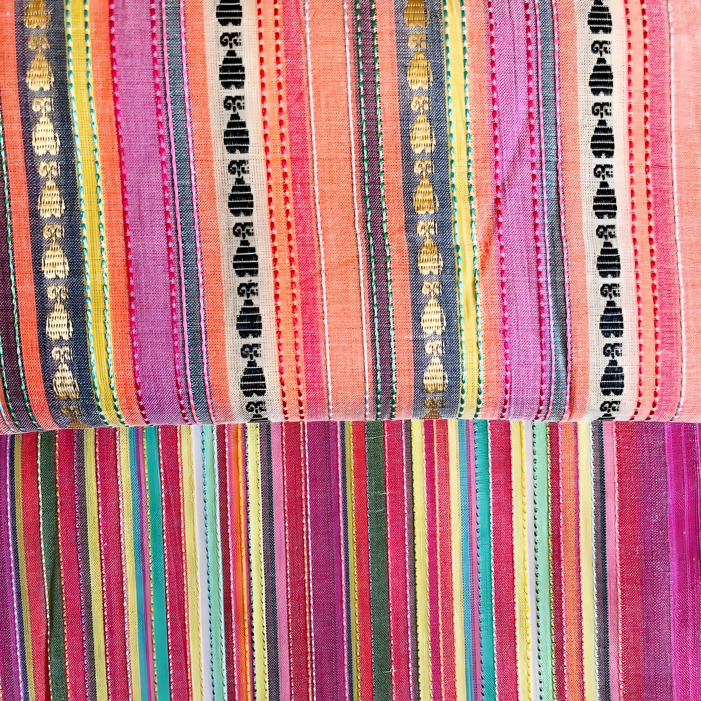 Texture detail of soft winter cotton fabric showing colorful stripes and fine thread lines.