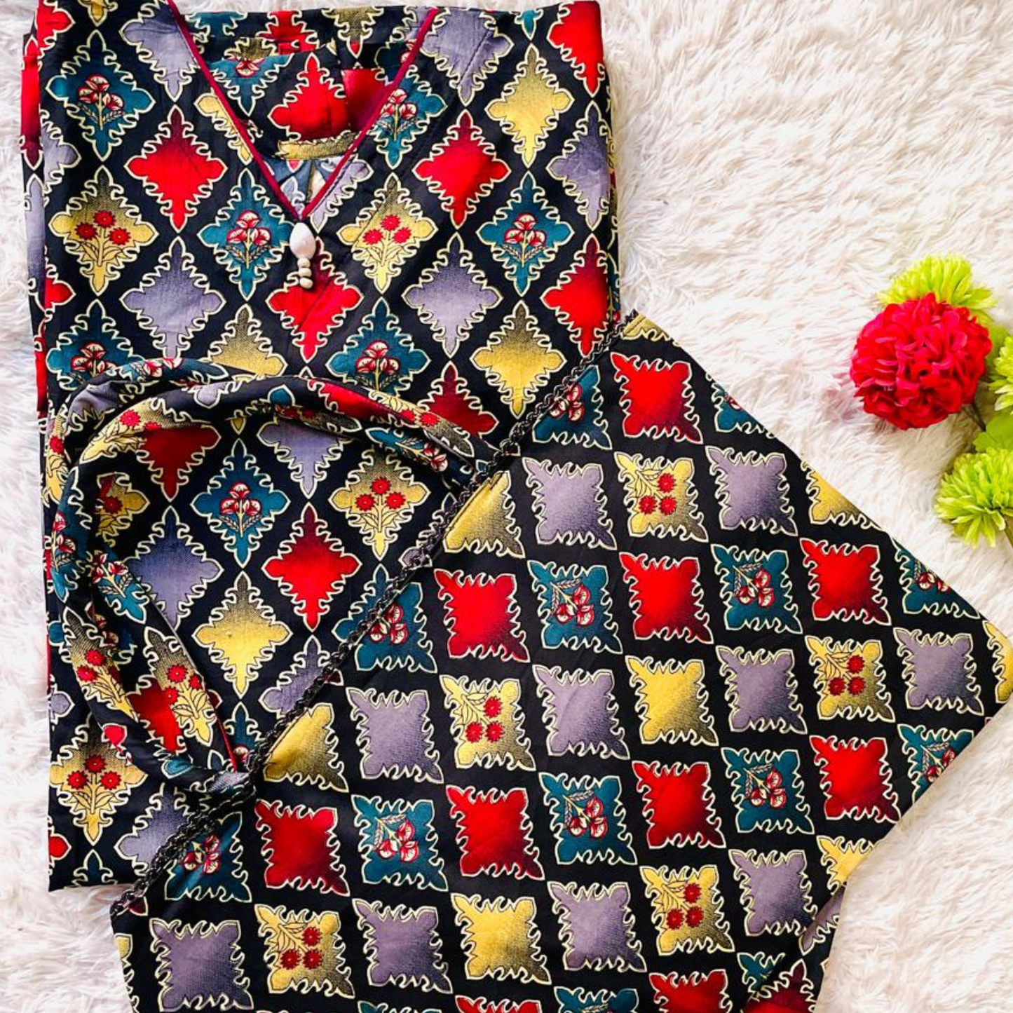 Vibrant Swiss fabric cord set for women by SEIN ATTIRE, featuring bold geometric prints and a coordinated handbag for effortless style.