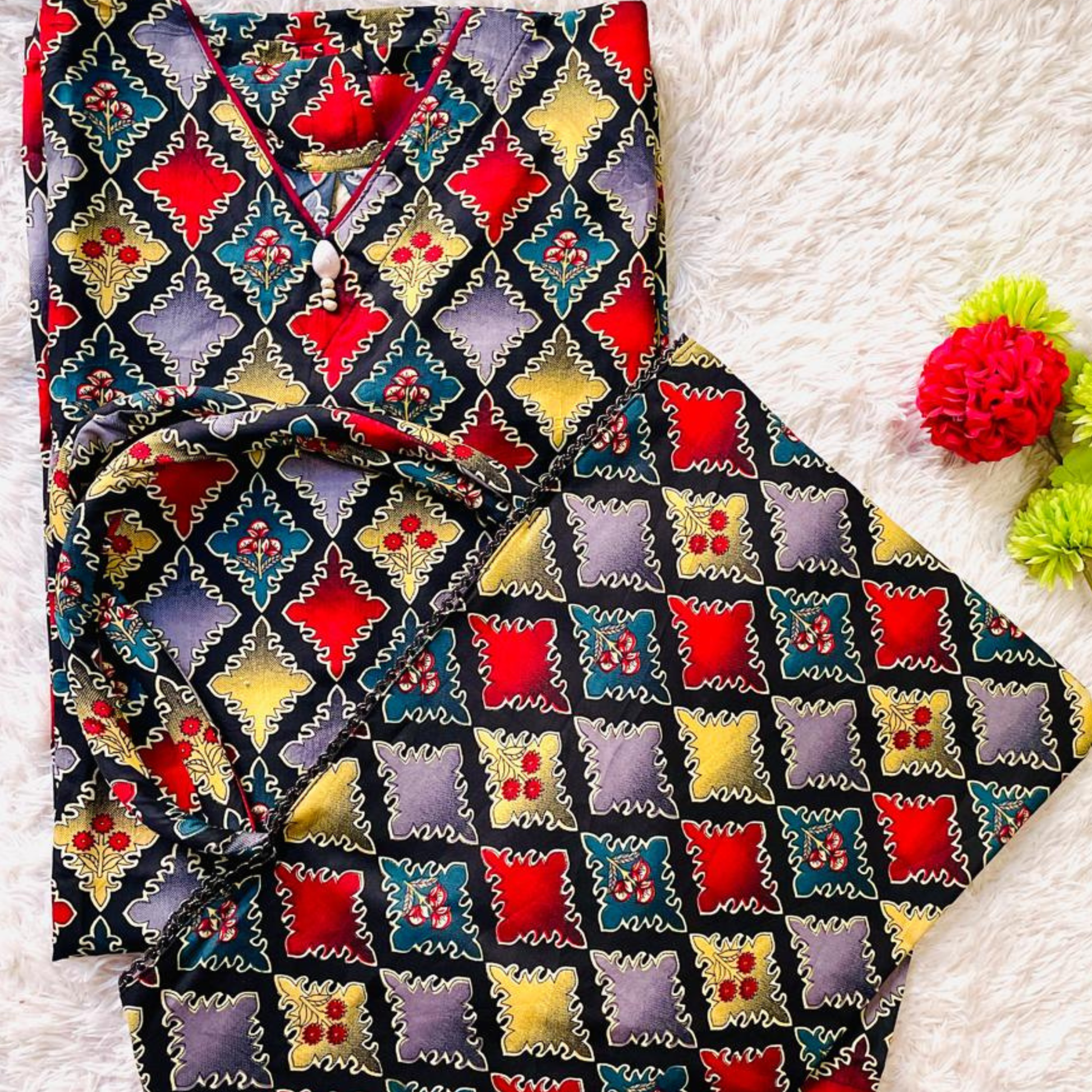 Vibrant Swiss fabric cord set for women by SEIN ATTIRE, featuring bold geometric prints and a coordinated handbag for effortless style.