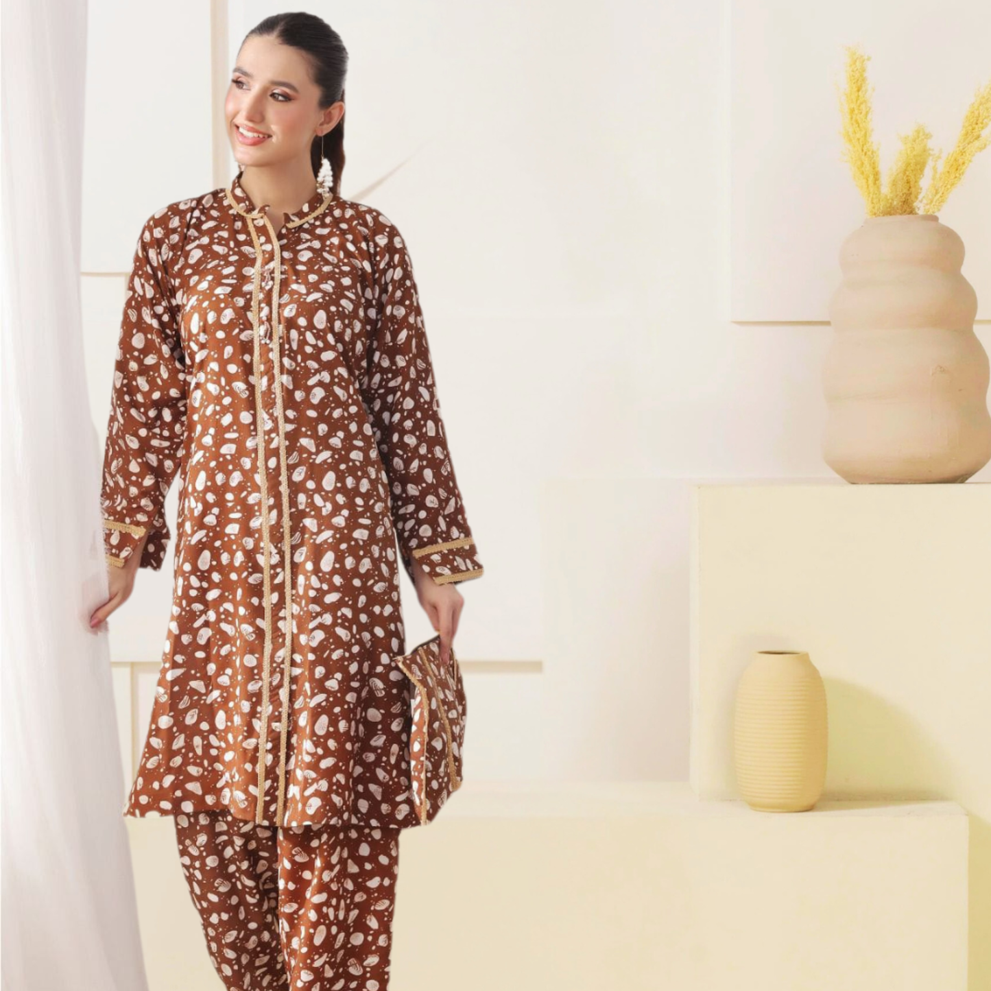 Women’s brown Swiss fabric ready-to-wear 3-piece set by SEIN ATTIRE, includes printed shirt, trouser, and stylish matching handbag.